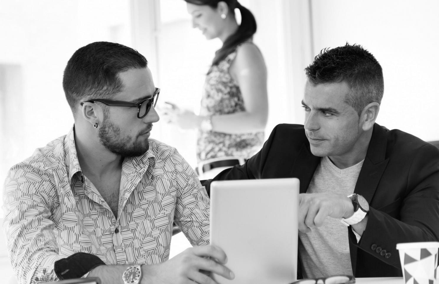 Students collaborating on programming project