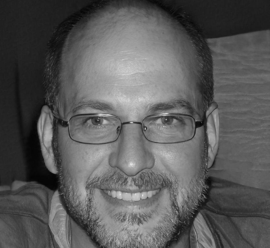 Instructor reviewing code with student